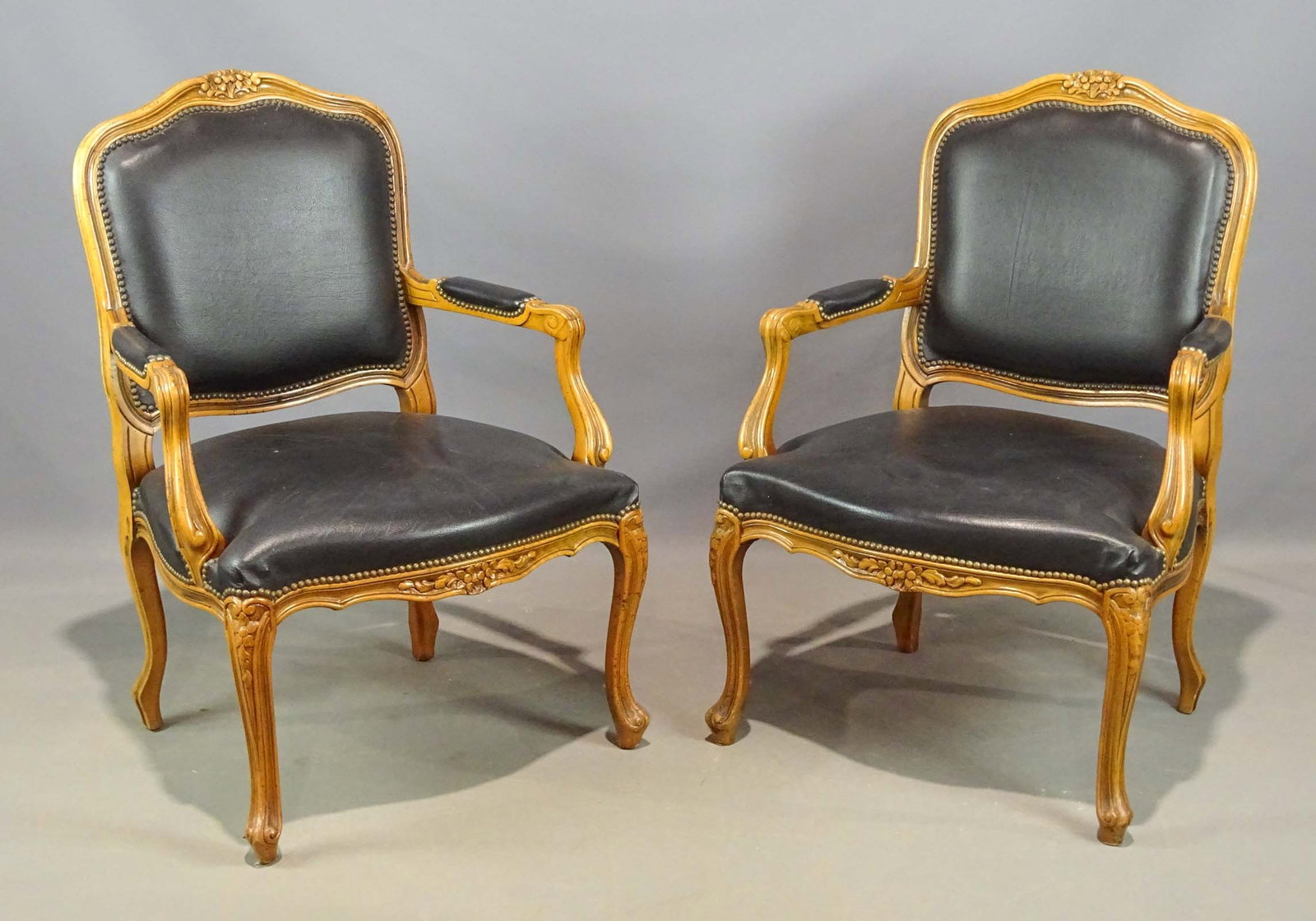 Pair French Style Armchairs: Pair of French style wood upholstered armchairs. 18" seat Ht., 38" overall Ht..