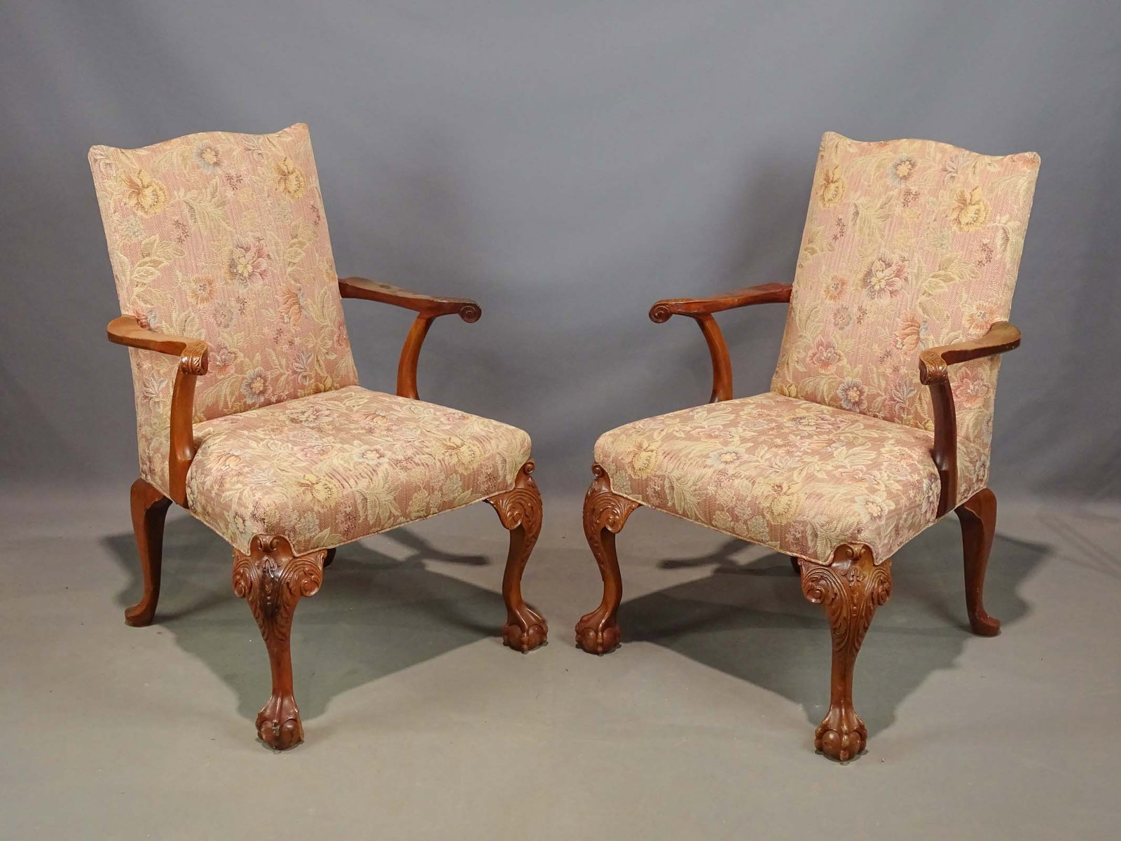 Pair Carved Upholstered Armchairs: Pair of Chippendale style carved upholstered armchairs. 18" seat Ht., 38 1/2" overall Ht..