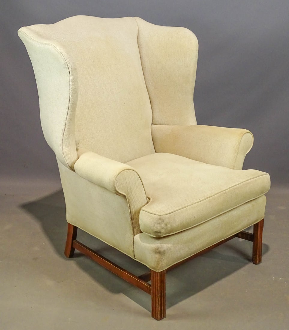 Chippendale Style Wing Chair: 20th Century Chippendale style wing chair. Upholstery stained. 19" seat Ht., 40 1/2" overall Ht..