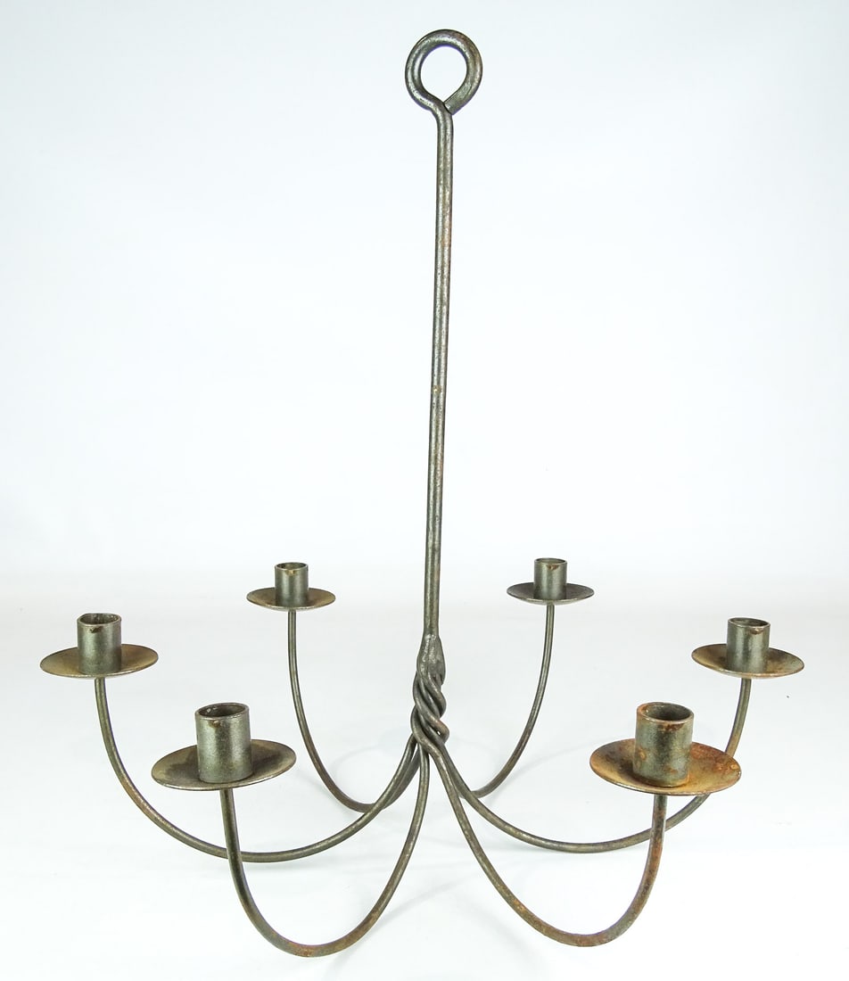 Wrought Iron Chandelier: Wrought iron (6) arm chandelier. 18" D., 20" Ht..