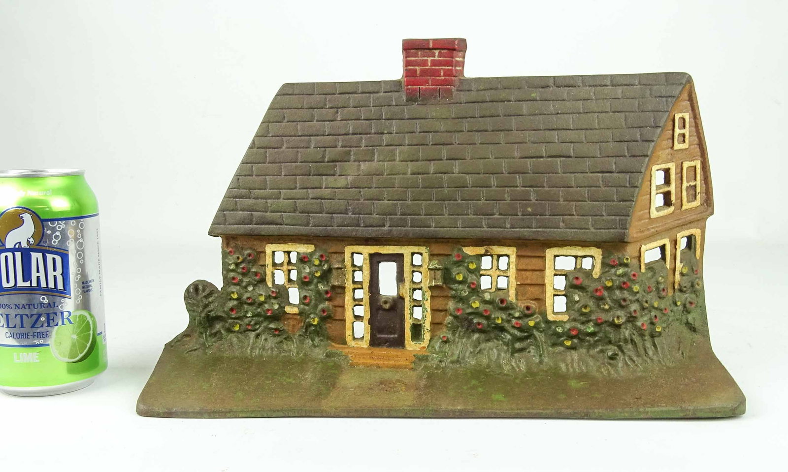 Bungalo Doorstop: Cast iron Bungalo doorstop / light. 7 5/8" x 12 1/4".