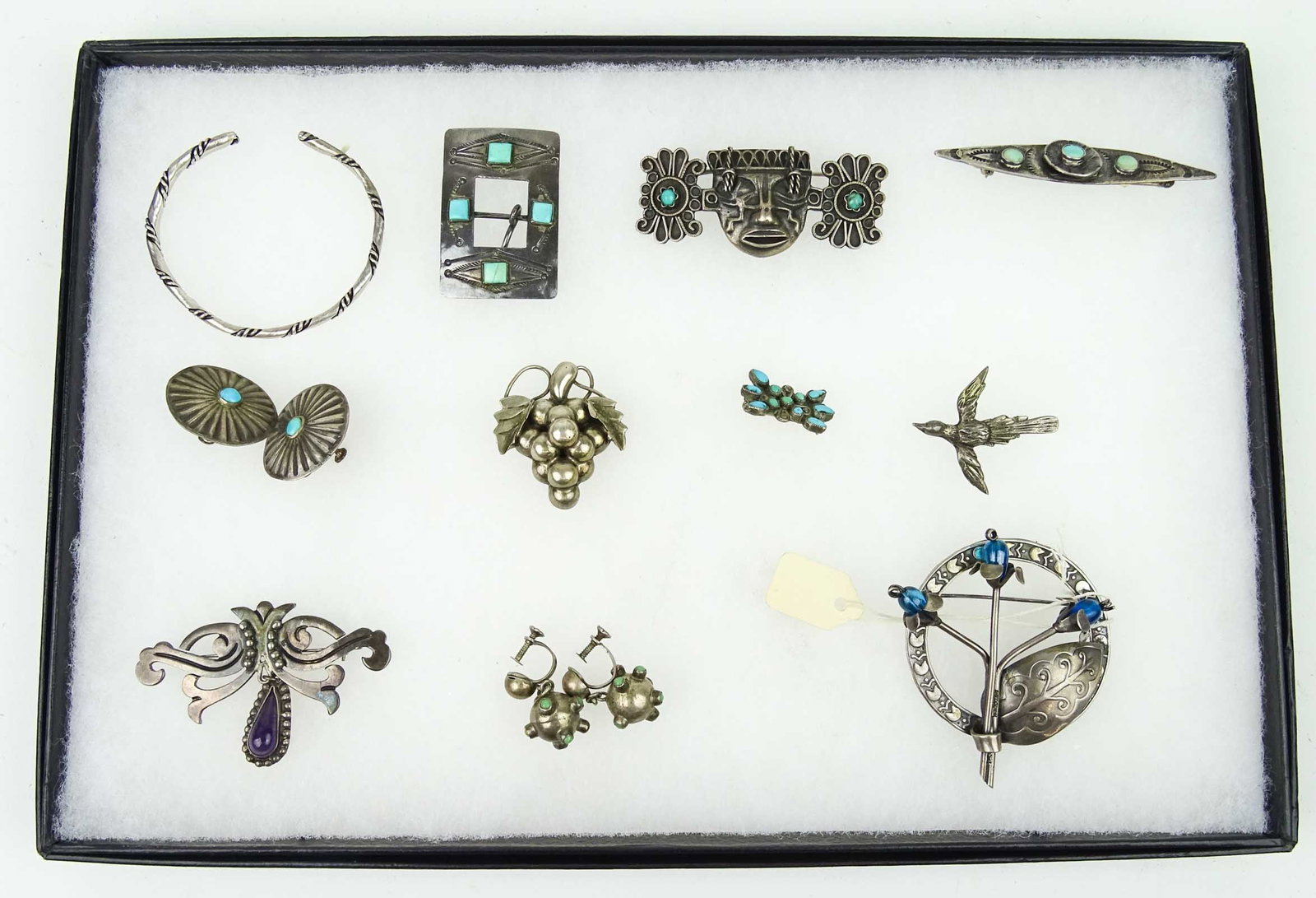 Jewelry Lot: Lot of Mexican sterling jewelry including pins, bracelet, earrings. Some with stones. Case not included.