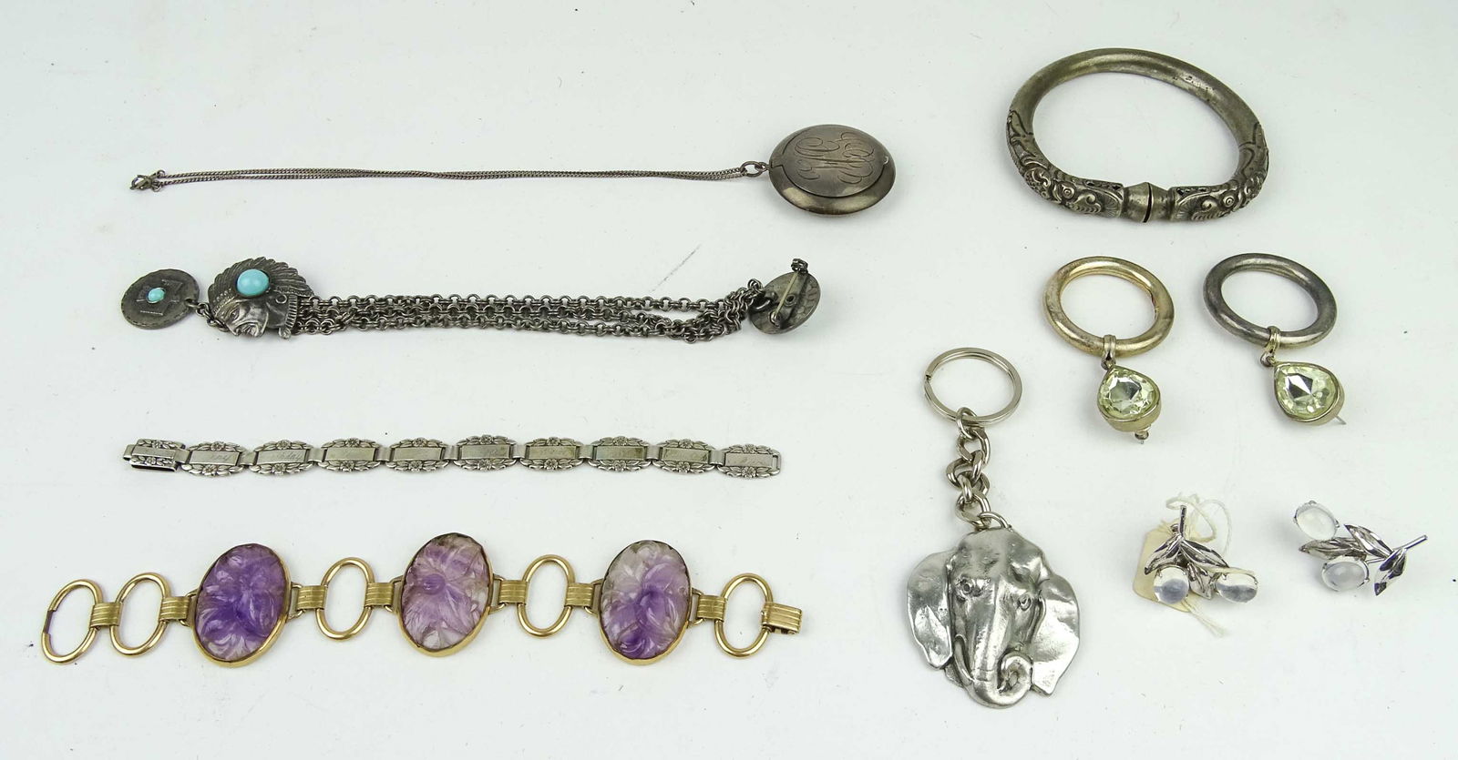 Jewelry Lot: Jewelry lot including pewter keychain, bracelets, earring.