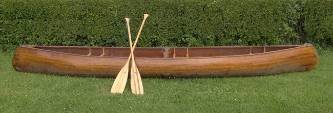 Canoe: Wooden canoe. 16' Length.