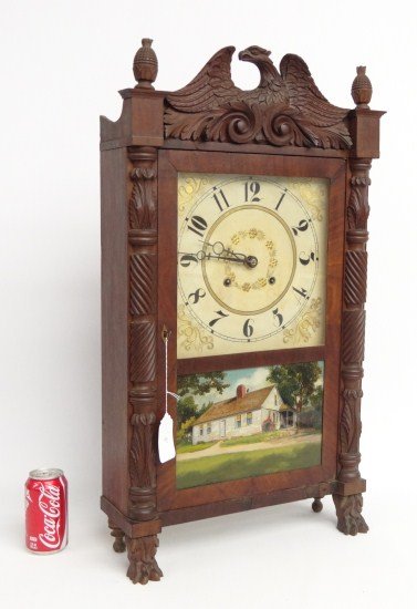 19th c. Riley Whiting Clock: 19th c. Riley Whiting mantle clock with eagle crest and carved feet. 17" W 31" Ht.