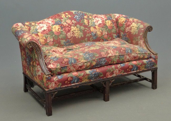 Chippendale Style Sofa: Chippendale style settee with molded legs and stretcher base. 57" W.