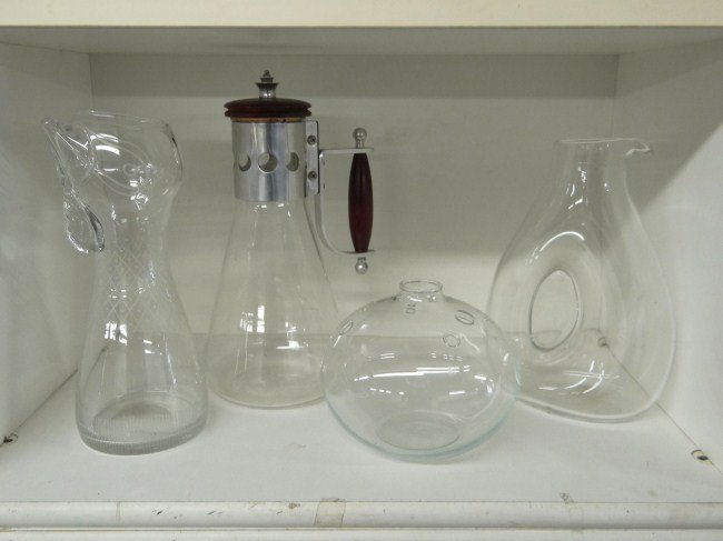 Glassware Lot: Lot including "Kosta" vase, Modernist coffee carafe, clear glass pitcher and "Holmegaard" vase.