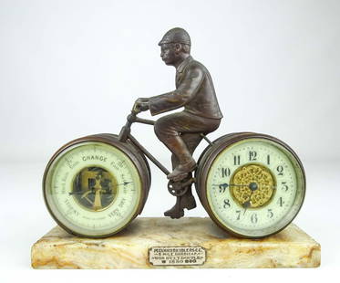 Bronze Safety Clock & Barometer: Bronze safety rider on marble base clock & barometer. Front labeled "PECKHAM RAMBLERS RS.C.C. 5 Mile Handicap WON BY T. BOUTLE 1899". 7 1/2" W., 7" Ht.. Good condition. Clock doesn't operate. Ed