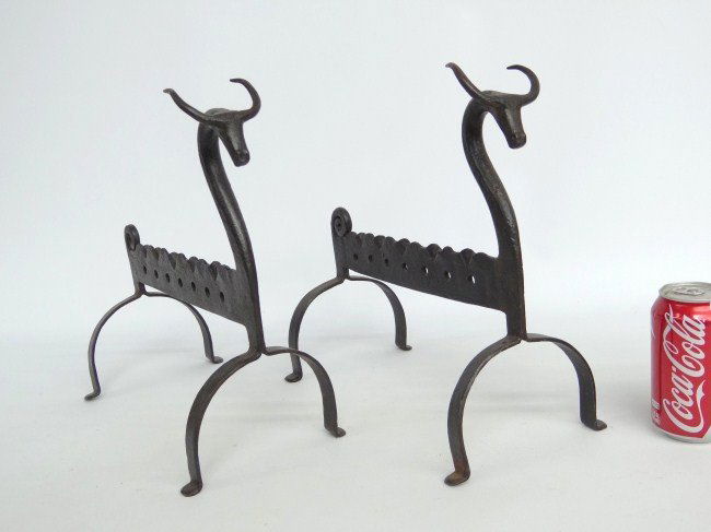 Andirons: Pair folky blacksmith made Etruscan motif andirons. 13" Ht. 13" D.