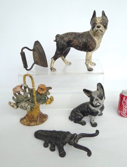 Doorstop Lot: Lot including two terrier doorstops, beetle bootjack, sad iron and flower basket doorstop.