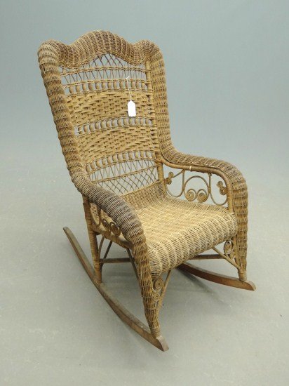 Wicker Rocker: Victorian wicker rocking chair. As found. 40" Ht.
