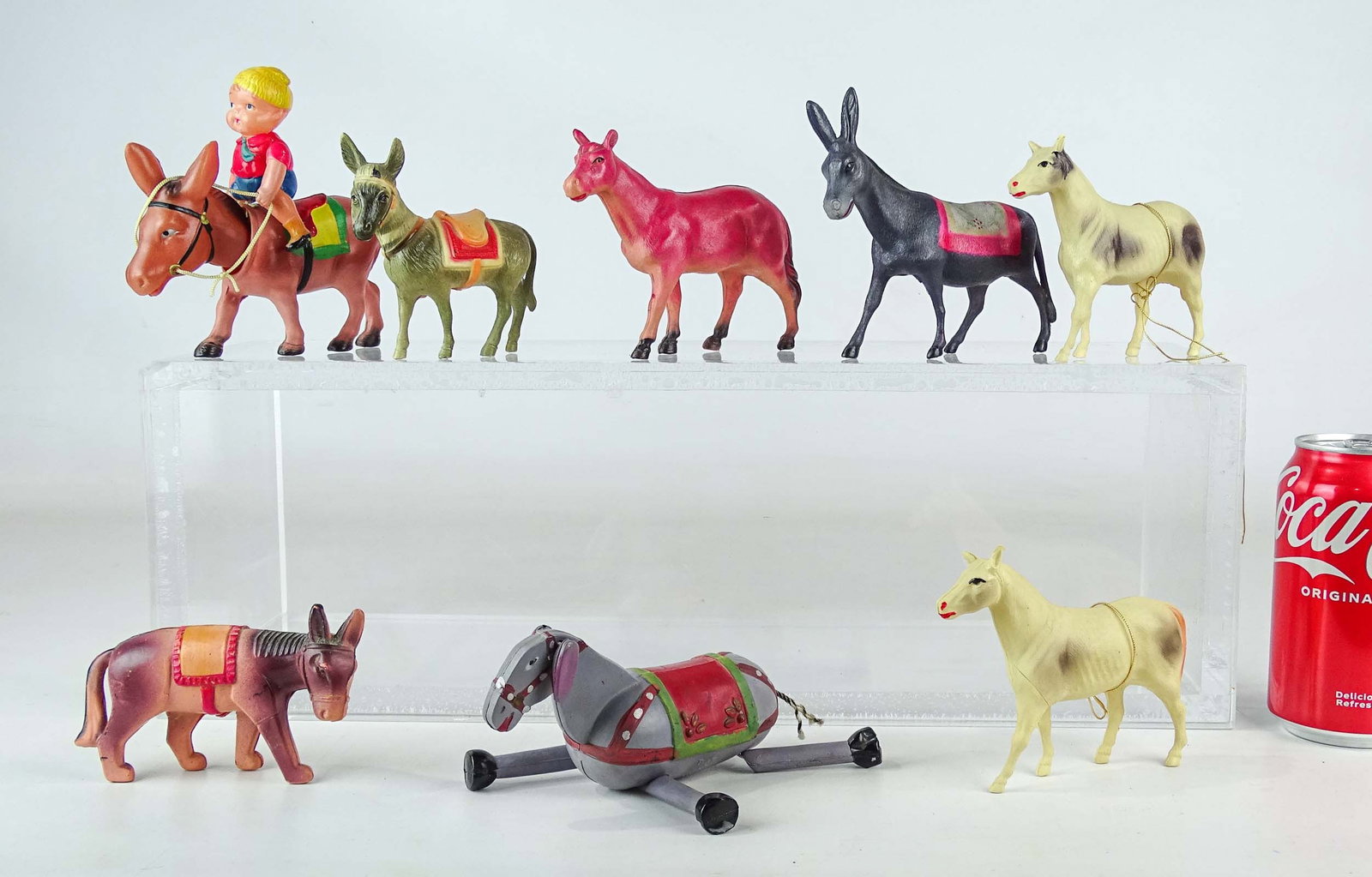 Celluloid Horses: Lot (8) celluloid horses and donkeys.