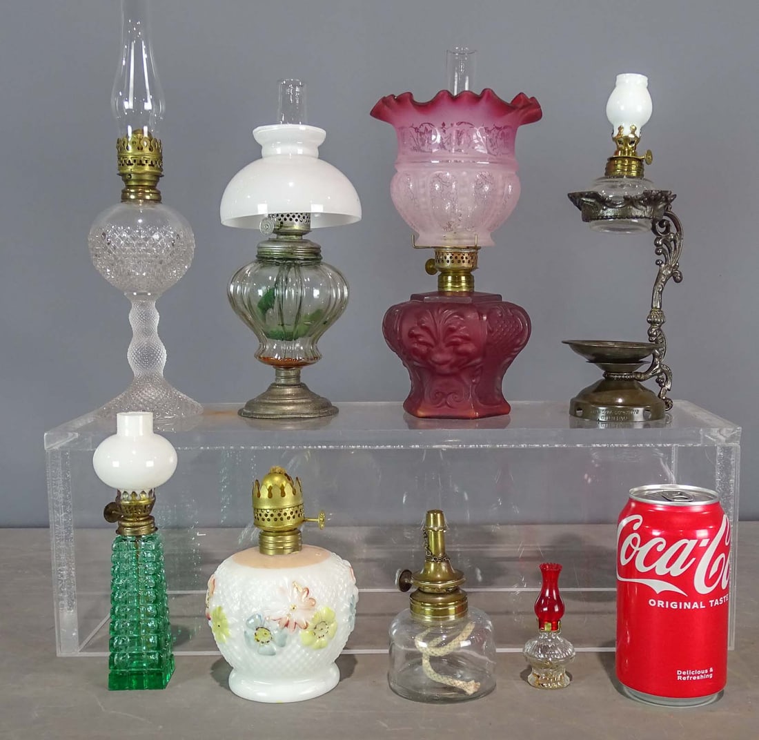 Oil Lamps: Lot (8) miniature oil lamps. Tallest 12" Ht..