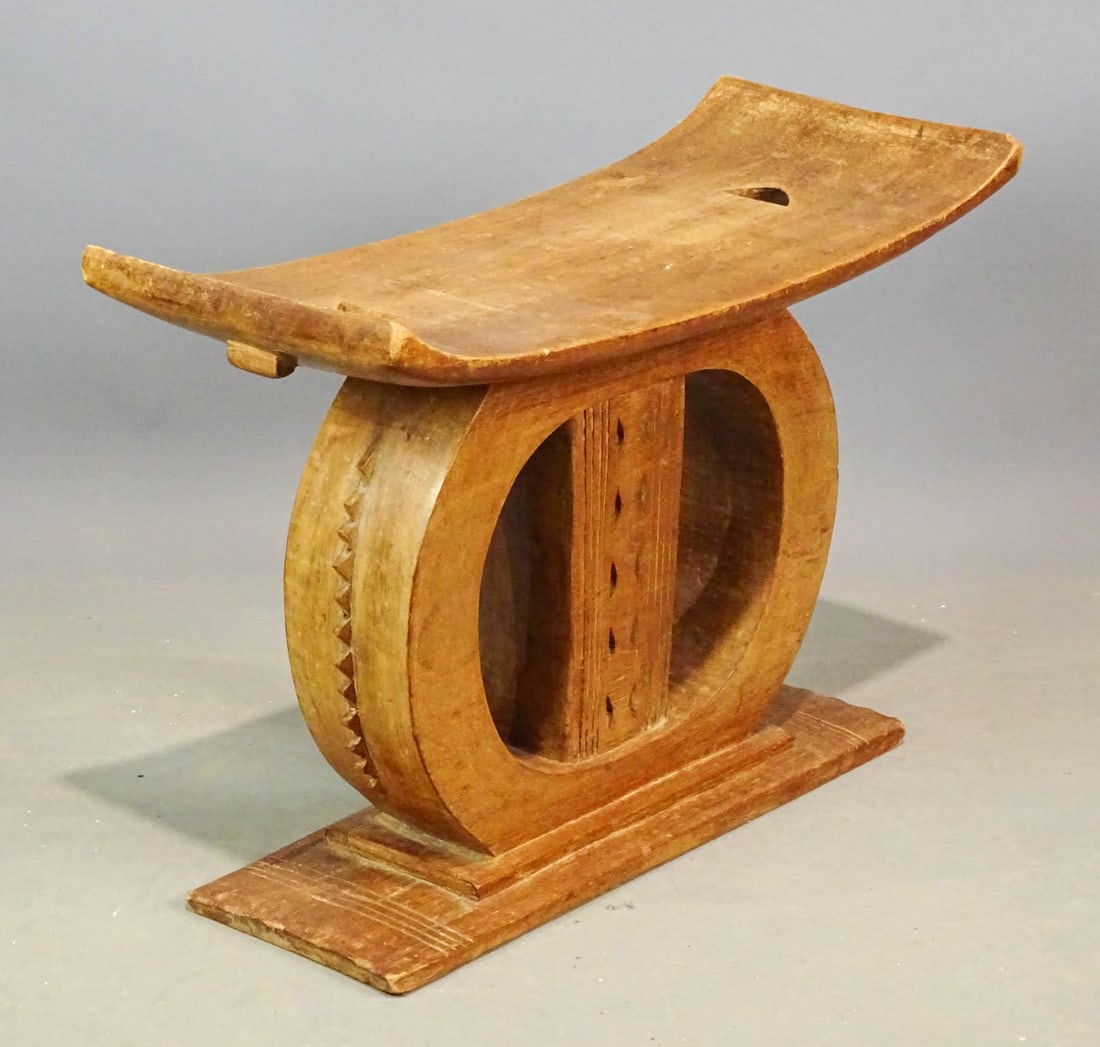 Ashani Stool: Carved wooden Ashani stool. 21" x 9 3/4" x 16 1/2".