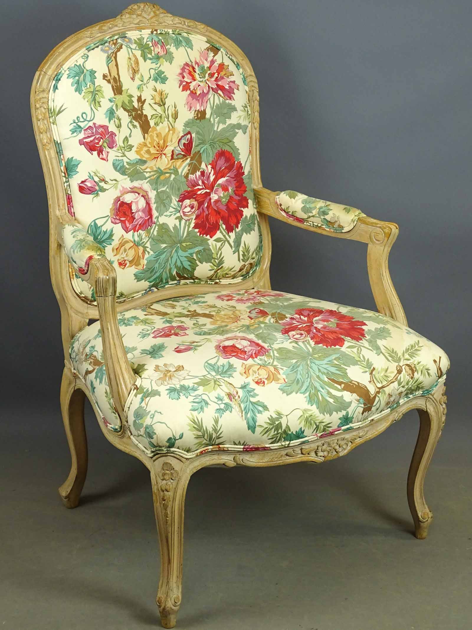 French Armchair: French style carved upholstered armchair. 16" seat Ht., 40 1/2" overall Ht..