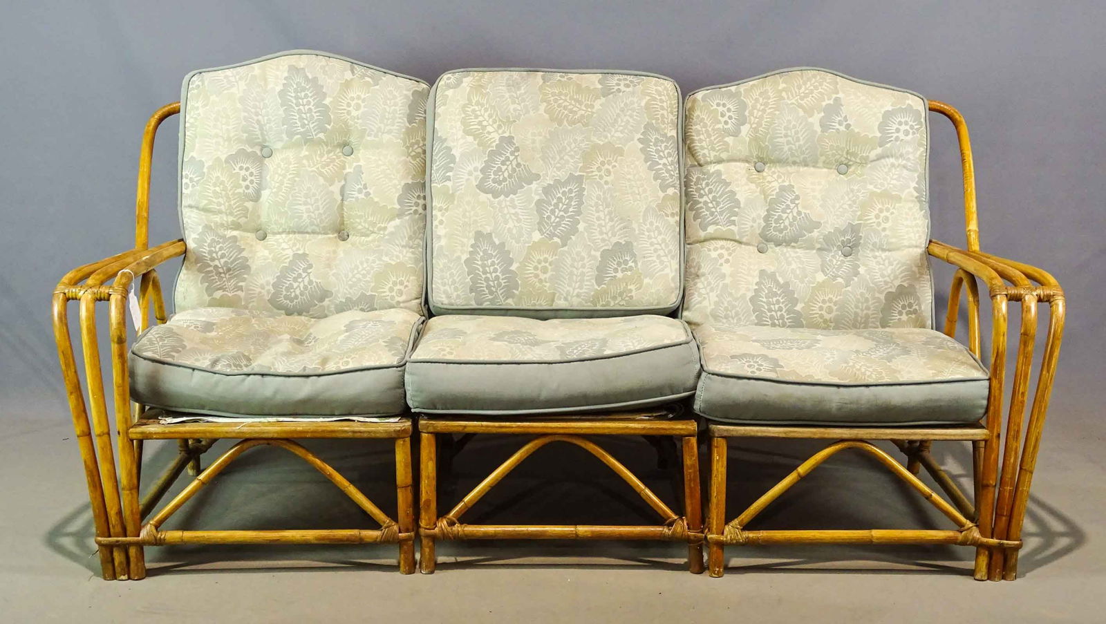 Rattan Settee: Three part rattan settee. Overall 72".