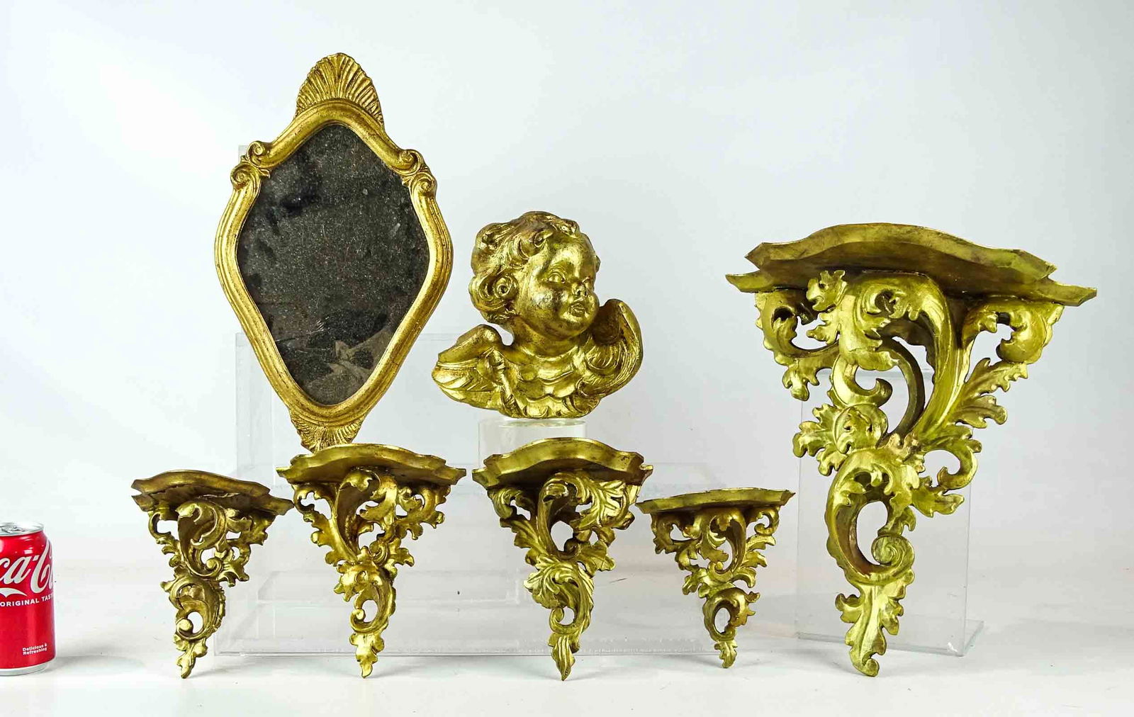 Misc. Lot: Lot including wooden carved Angel head, 7 1/2" L., (5) wall brackets (tallest 15 1/2" L.), and mirror (15 1/2" L.).