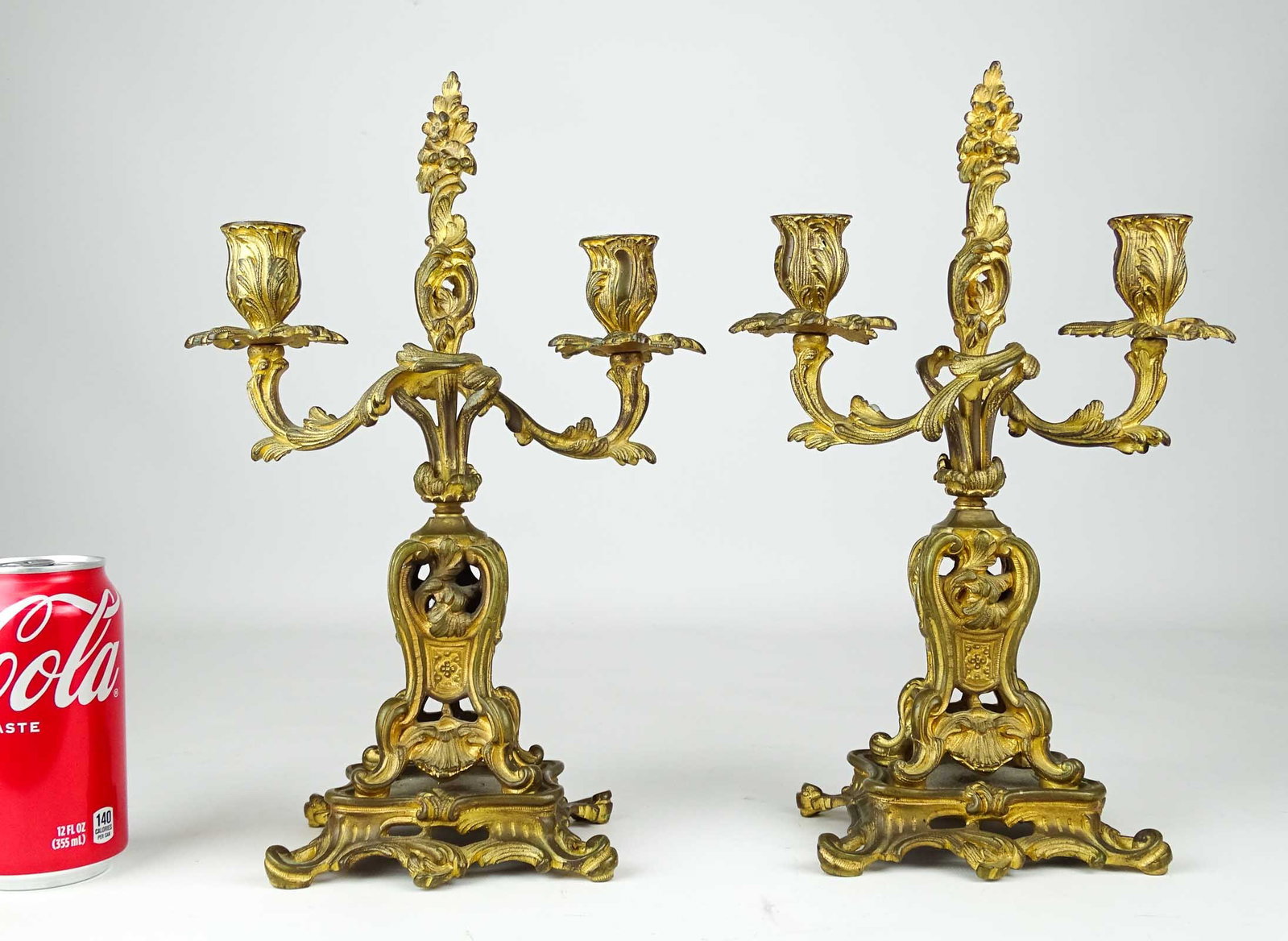 Pair of Candelabra: Pair of early metal candelabra. 13" Ht..