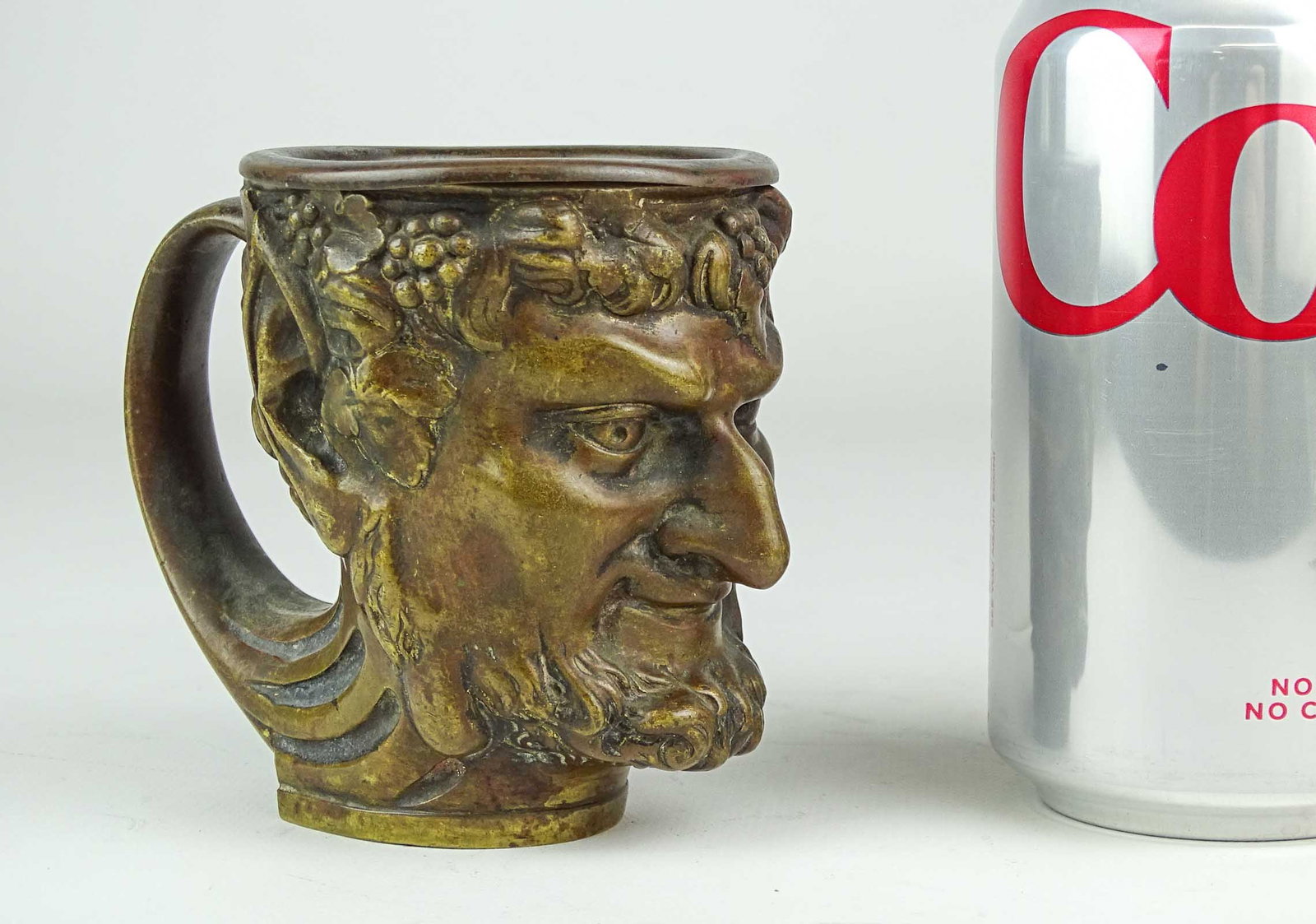 Brass Mug: Figural brass mug with insert. 3 3/4" Ht..