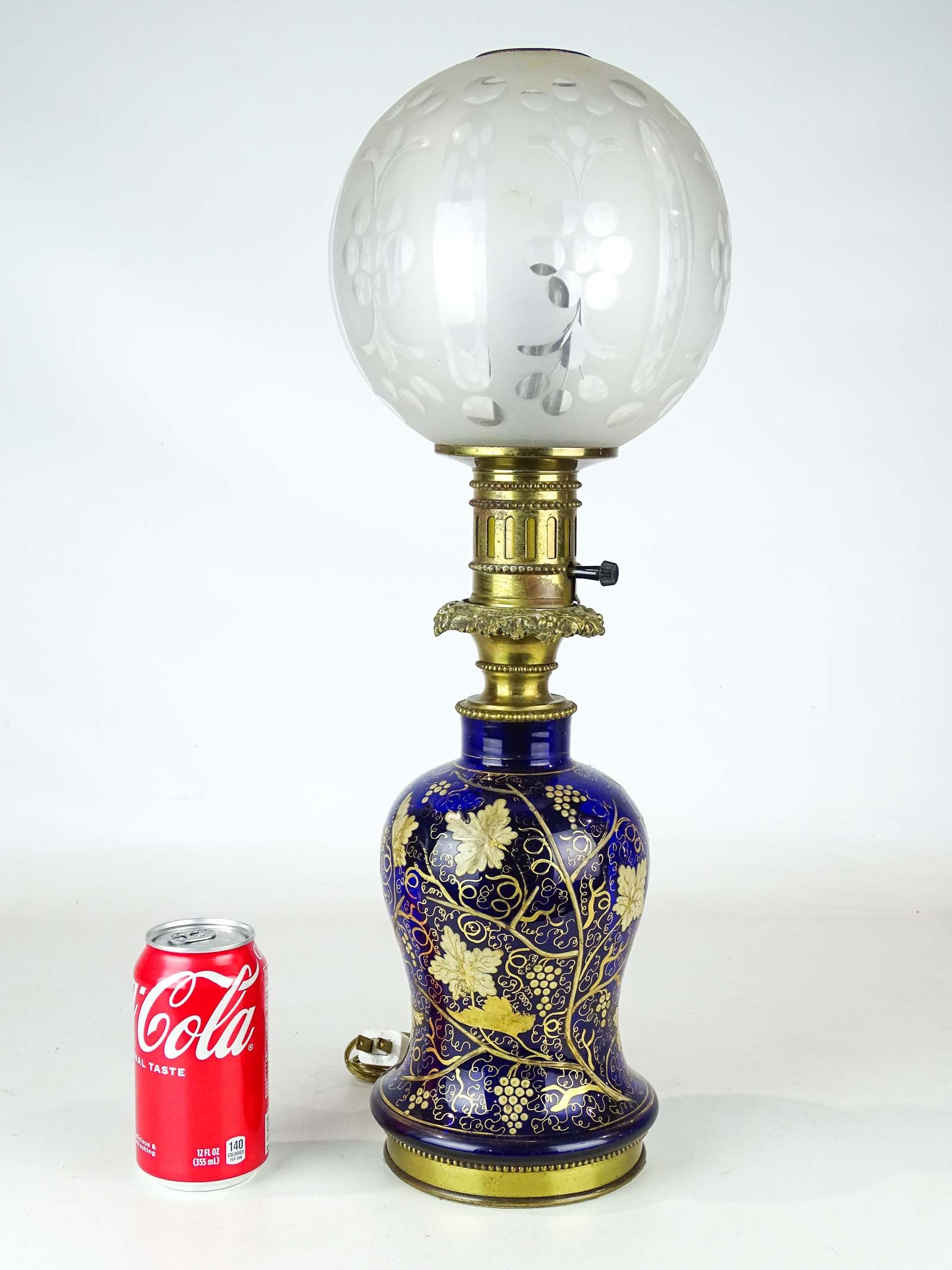 19th c. Hand Painted Lamp: 19th c. hand painted cobalt glass lamp with shade. 22" overall Ht..