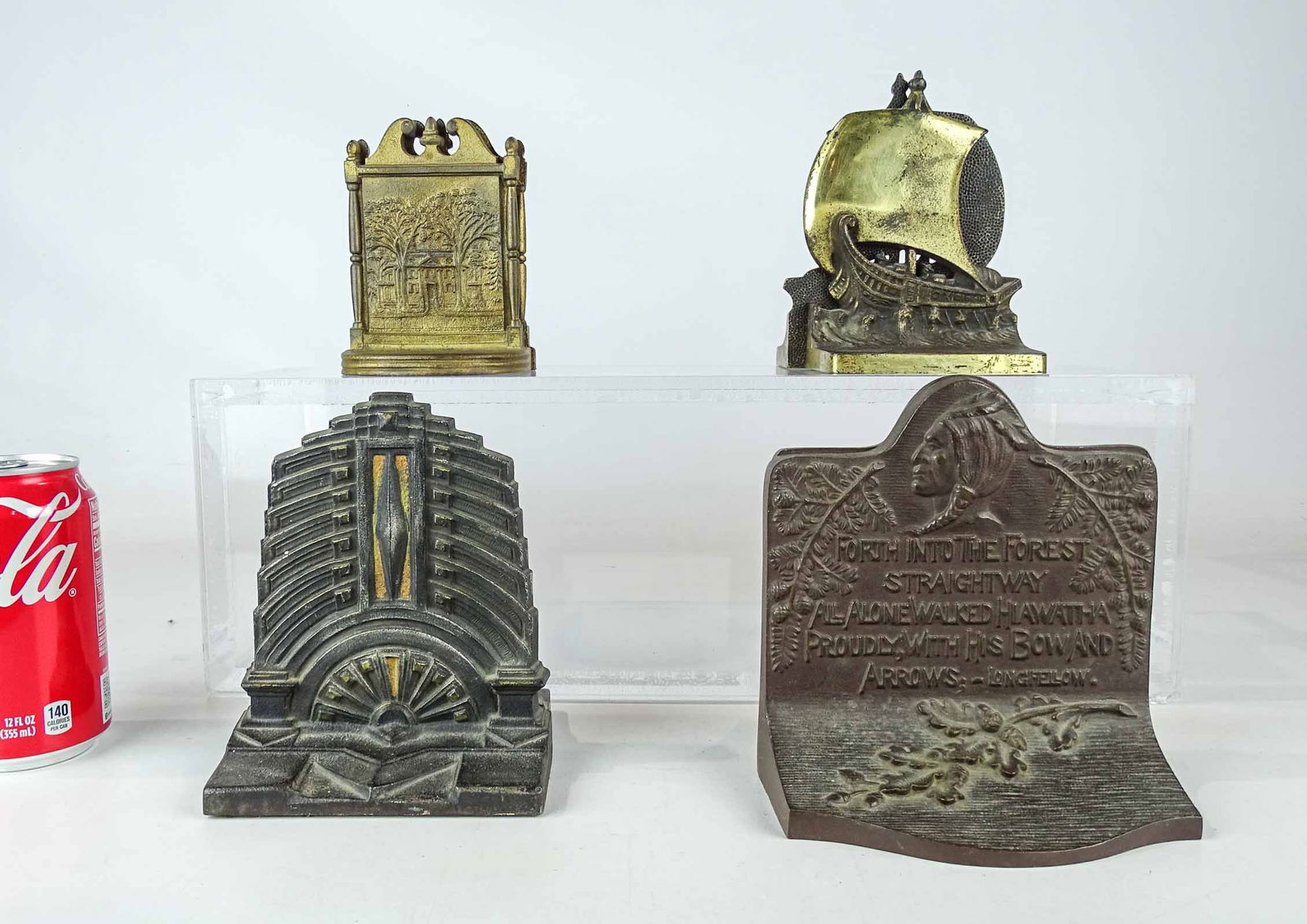 Doorstop Lot: Lot (4) pair of Bradley & Hubbard doorstops including: cast iron Viking Ship (6" Ht.), cast iron Hiawatha (6 1/4" Ht., C. 1925), cast iron Country-House (5" Ht., C. 1925), cast iron Art Deco (6" Ht.,