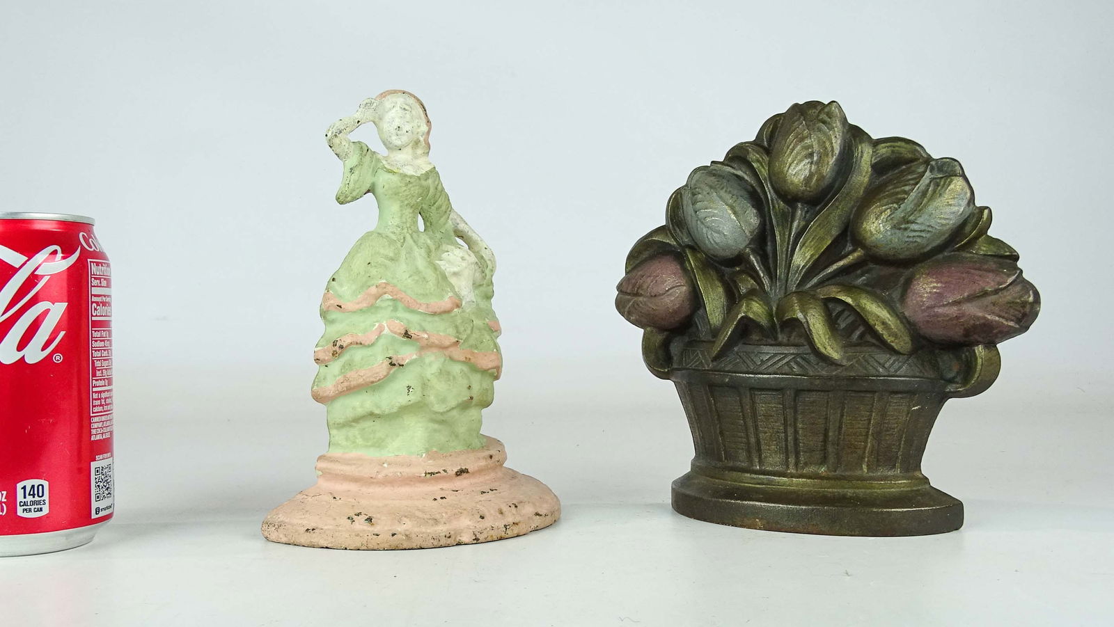 Doorstop Lot: Lot (2) cast iron doorstops including: Tulips (6 3/8" Ht., Ct. Foundry), and Little Bo Peep (7" Ht., Hubley).