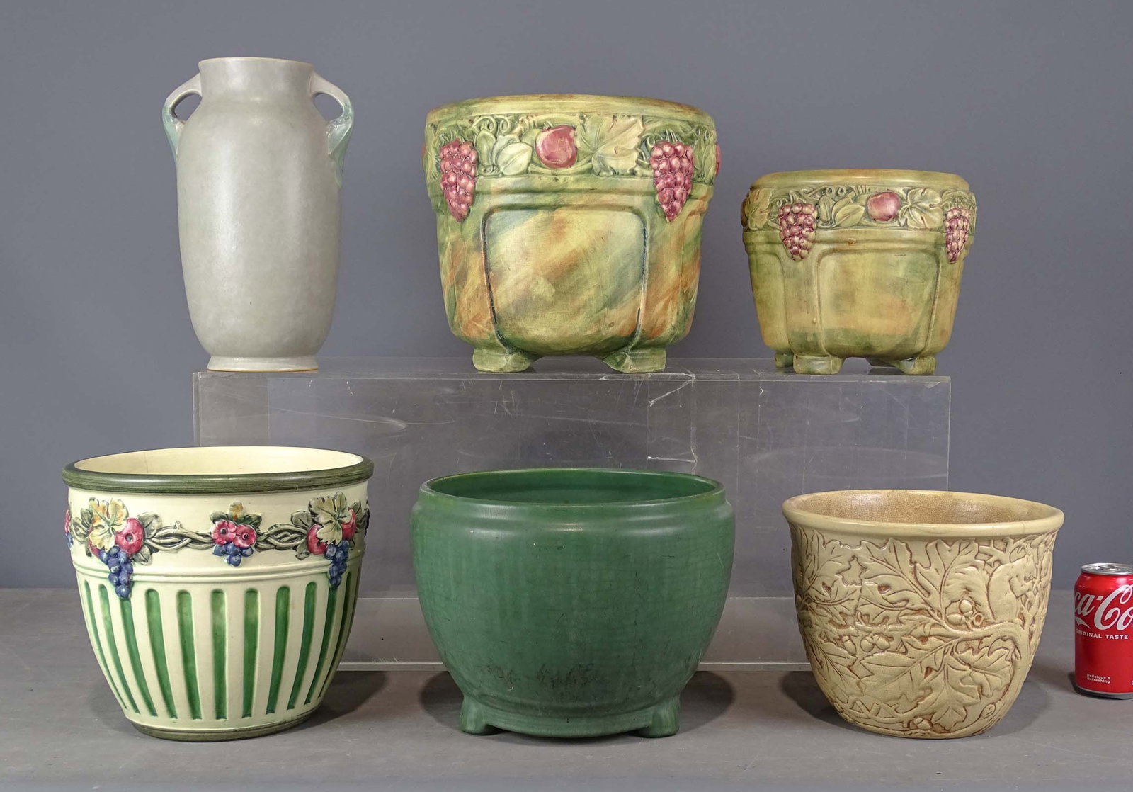Pottery Lot: Lot (5) jardinieres (largest 11" D., 11" Ht.), along with 12 1/2" Ht. vase. One jardiniere damaged. Barbara Packer Collection.