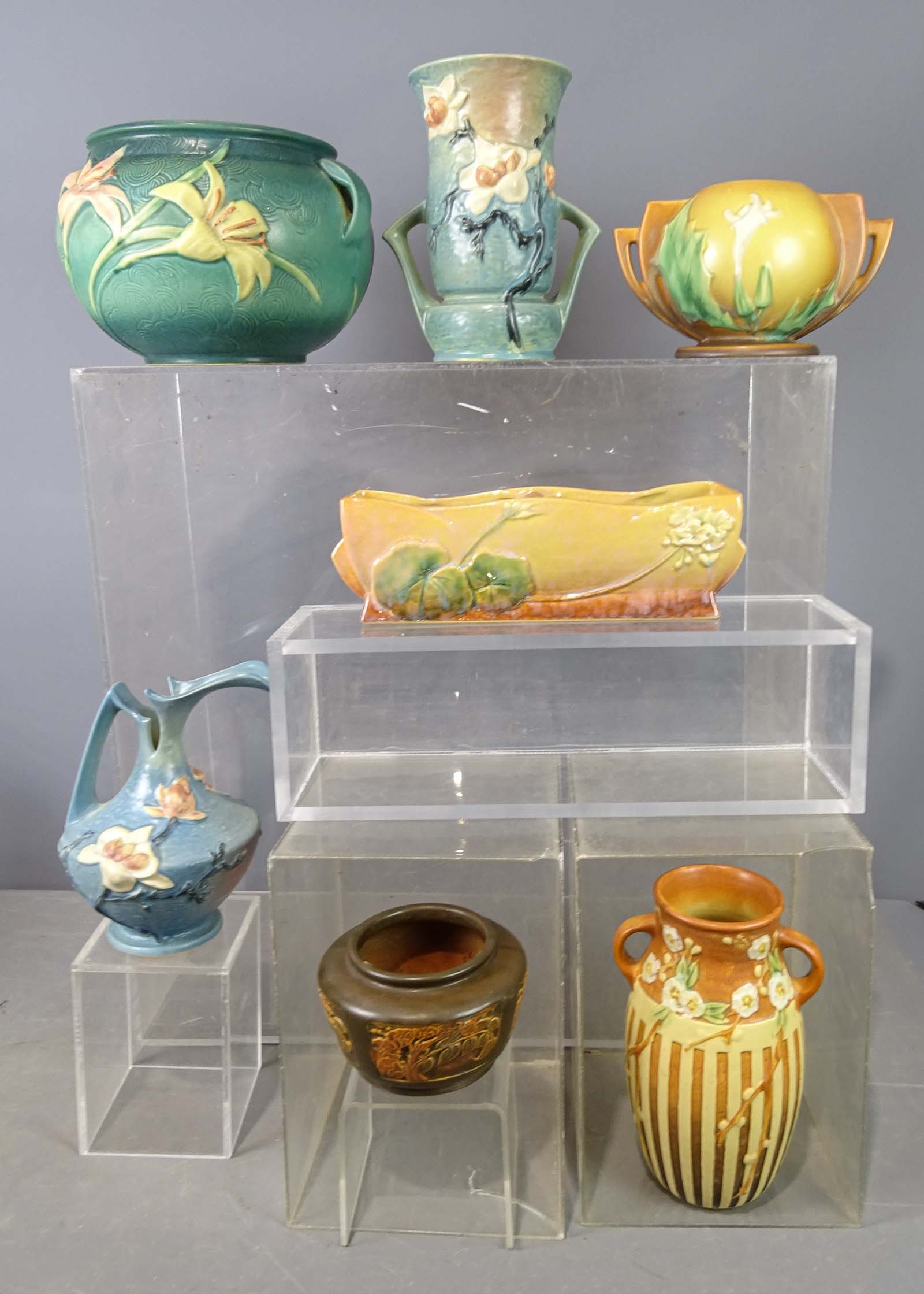Roseville Lot: Lot (7) pieces of Roseville pottery. Tallest 11" Ht.. Good condition. Barbara Packer Collection.