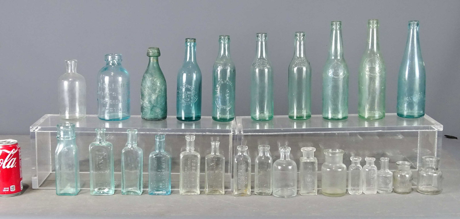 Bottle Collection: (26) early bottles. Some marked. Barbara Packer Collection.