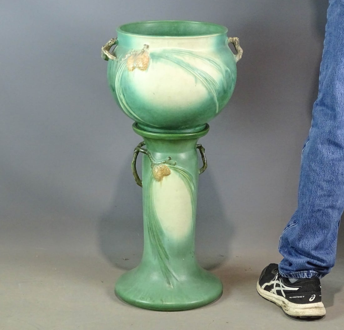 Roseville Jardiniere & Pedestal: Roseville jardiniere and pedestal. 28 1/2" Ht.. Tiny glaze chip. Barbara Packer Collection.