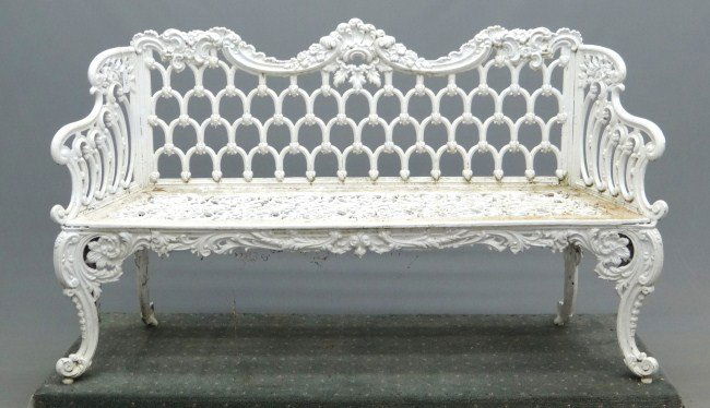 Cast Iron Bench: Cast iron garden bench. 62" W 16 1/2" D 37" Ht.