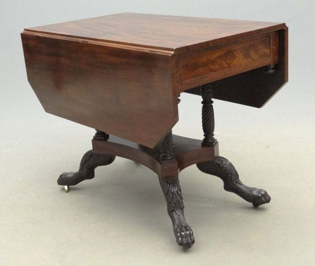 19th c. Classical Table: Early 19th c. School of Duncan Phyfe mahogany dropleaf table. Base has four colonettes and hairy paw feet. Top 21" x 36" with 12 1/2" Leaves, 28 1/2" Ht.