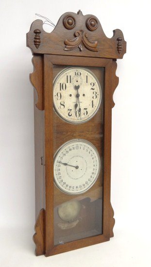 New Haven Calendar Clock: C. 1900 New Haven calendar clock. 43 1/2" Ht.