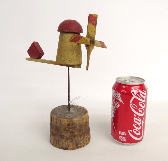 Lighthouse Whirligig: C. 1900-1920's Nantucket Mass. polychrome painted whirligig, signed "T.C.S." on base. 7" Length 3" Ht.