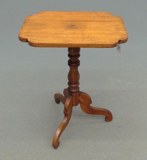 19th c. Candlestand: 19th c. shaped top cherry candlestand. Top 15" x 20", 26 1/2" Ht.
