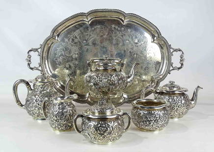 Silver Tea Set: Tea set including silver on copper tray (28" x 17", marked England), along with Dominick & Haff N.Y. (5) piece Sterling tea set. 3502 grams (tray not included).