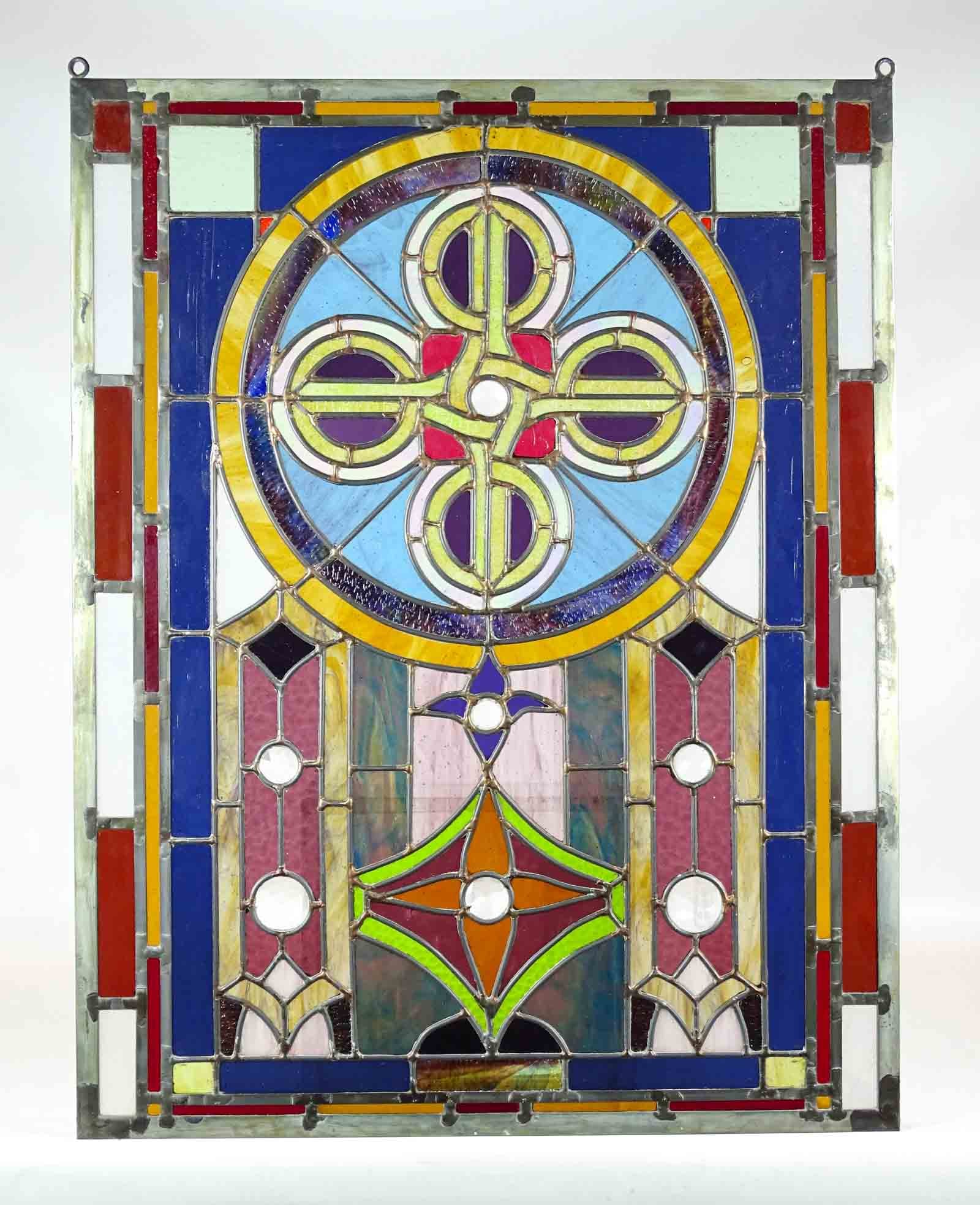 Stained Glass Window: Decorative stained glass window. 35 1/2" x 27".