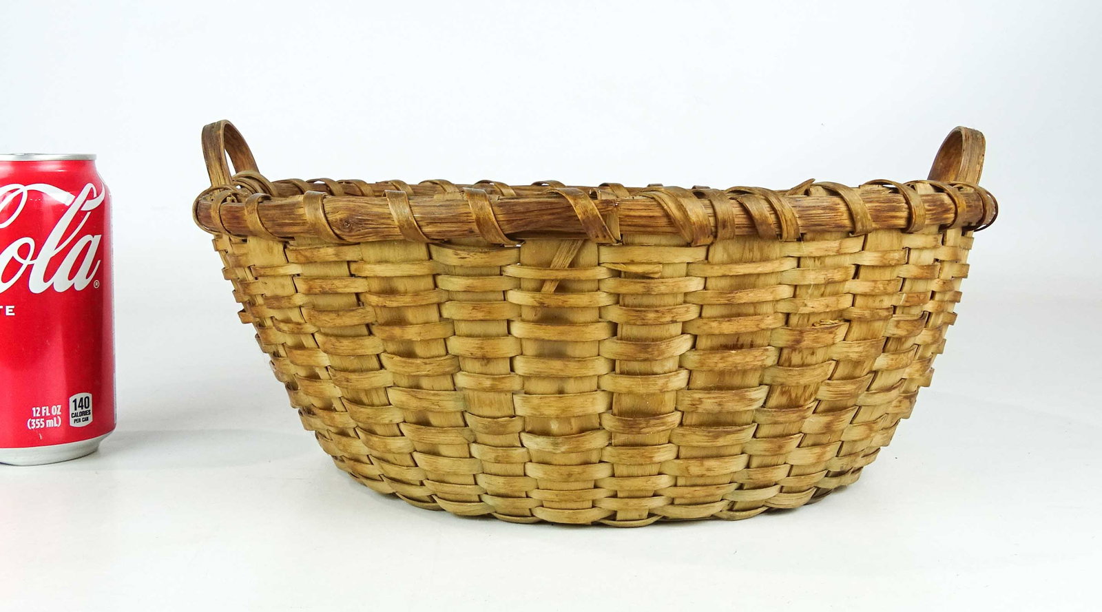 Taconic Basket: Early Taconic basket. 12 1/2" D., 5 1/2" Ht..