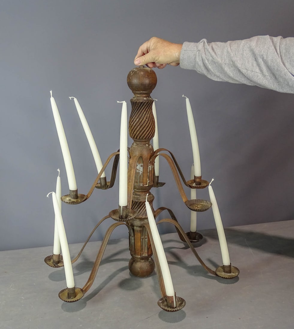 Wooden Chandelier: Carved wood and tin chandelier. 28" Ht..