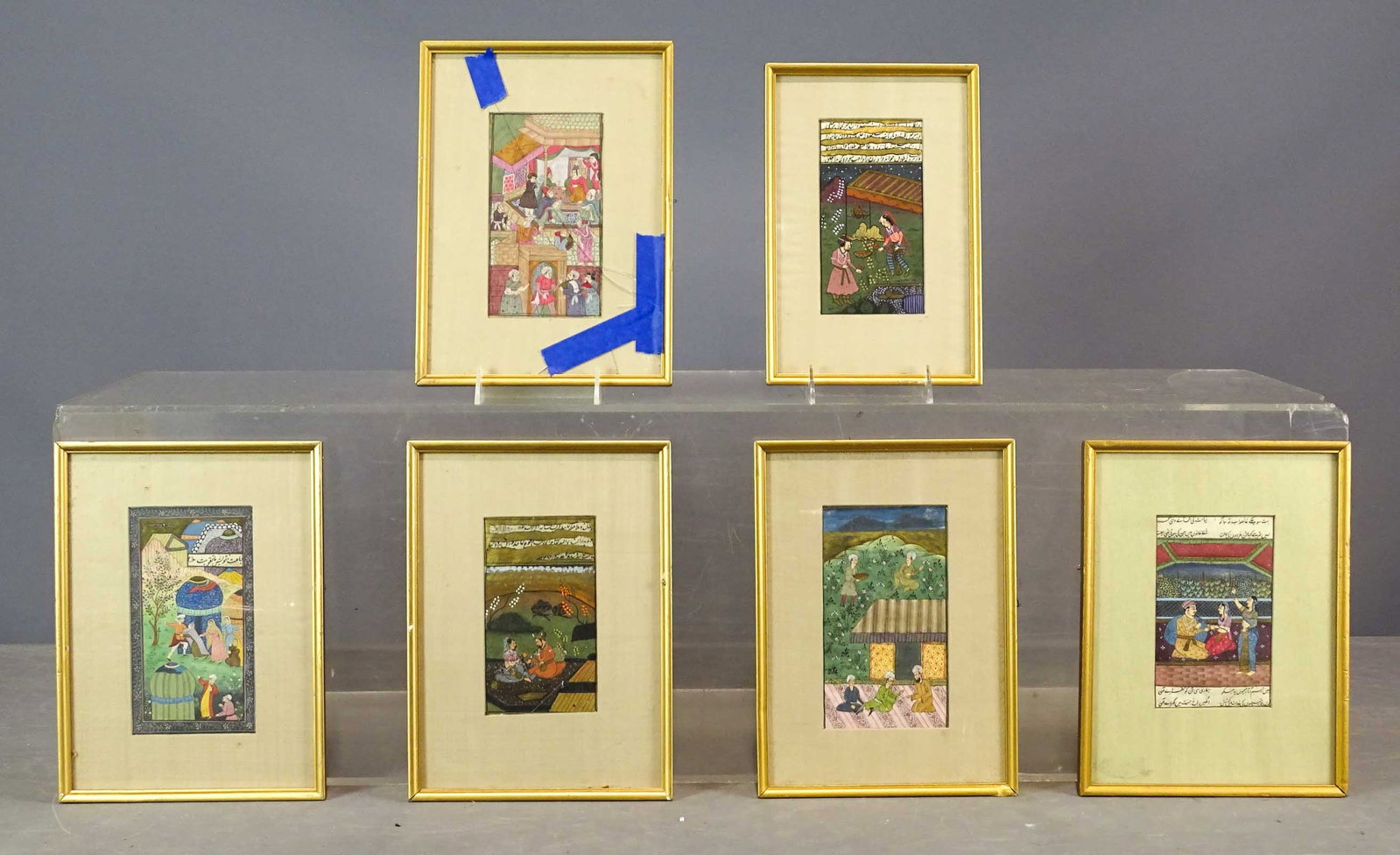 Indonesian School Paintings: Six Indonesian School paintings. One glass cracked. (5) sights 7" x 4", overall 11" x 8", the other sight 6 1/2" x 3 3/4", overall 10 1/4" x 7".