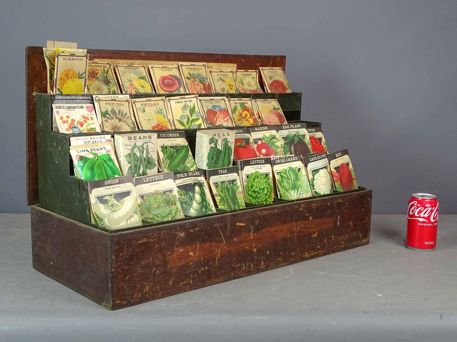 Seed Display: Early seed counter top display with original packets. Overall 27" x 12 1/2" x 17 1/2". Provenance: Clayton Store, Sue Connell, Southfield, Massachusetts