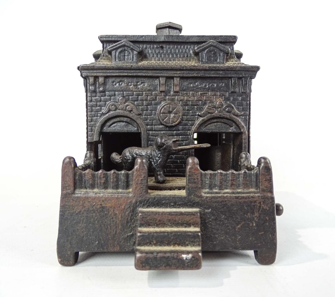 Dog on Turntable Mechanical Bank: 19th c. cast iron Dog on Turntable mechanical bank. Judd Mfg. Co., Wallingford Ct.. 4" W., 5" Ht..