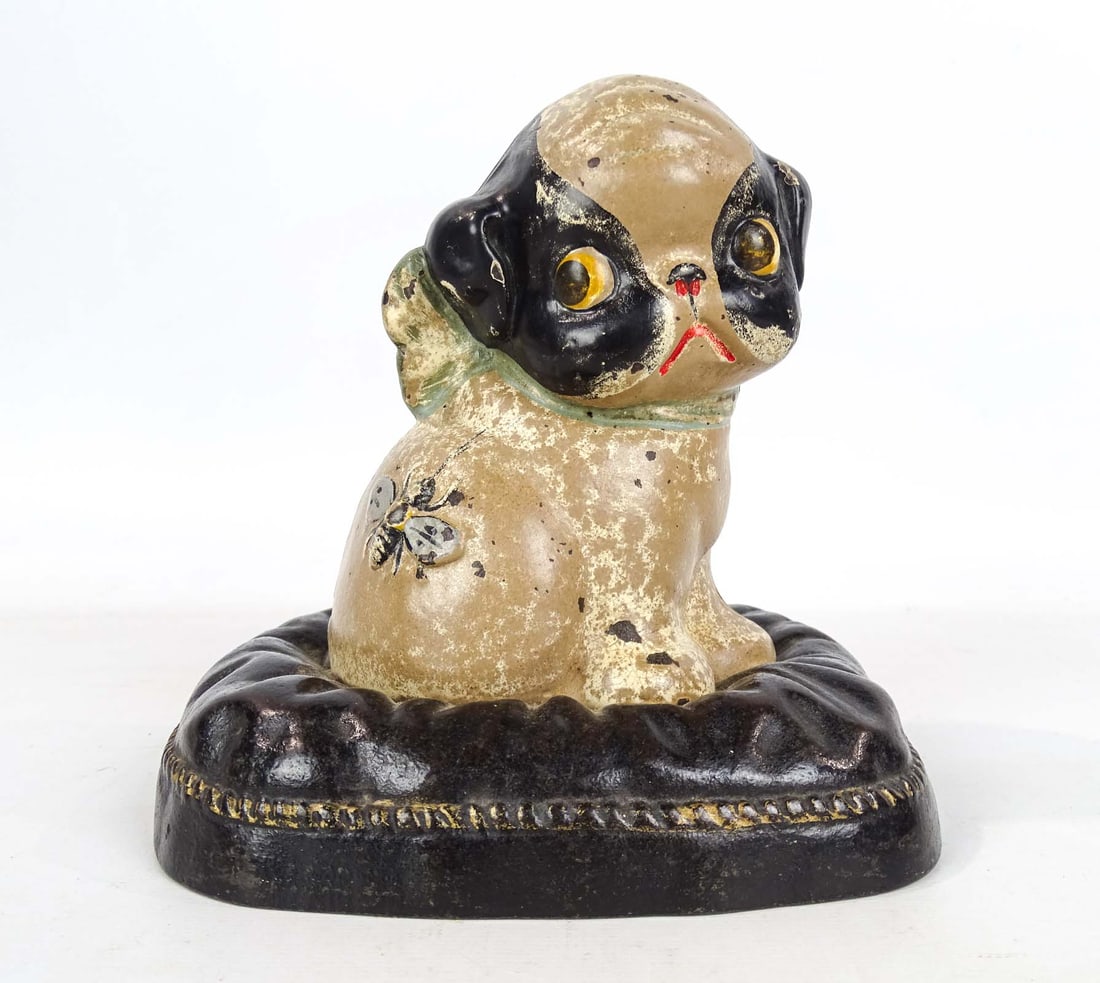 Hubley Pillow Dog Bank: Early cast iron Hubley Dog on Pillow bank. 5 1/2" W., 6 1/2" Ht..