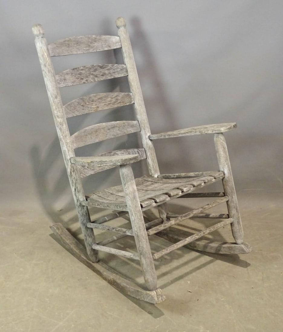 Porch Rocking Chair: Vintage porch rocking chair. Provenance: The Edward Herrmann Estate, Salisbury Connecticut.