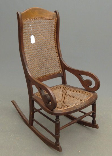 Victorian Rocking Chair: Victorian Lincoln rocker with cane seat and back. 16" Seat Ht. 42" Overall Ht.