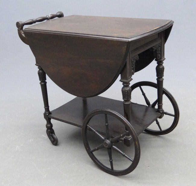 Tea Cart: 1940's rolling tea cart. Top 17" x 29" with 13" Leaves, 29" Ht.