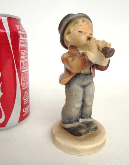 Hummel Figurine: Horn Blower MJ Hummel Figurine. Marked Germany. 5 1/2" Ht. Full bee.
