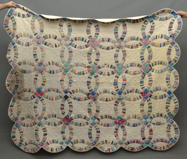 Quilt: C. 1940's Double Wedding Ring quilt.