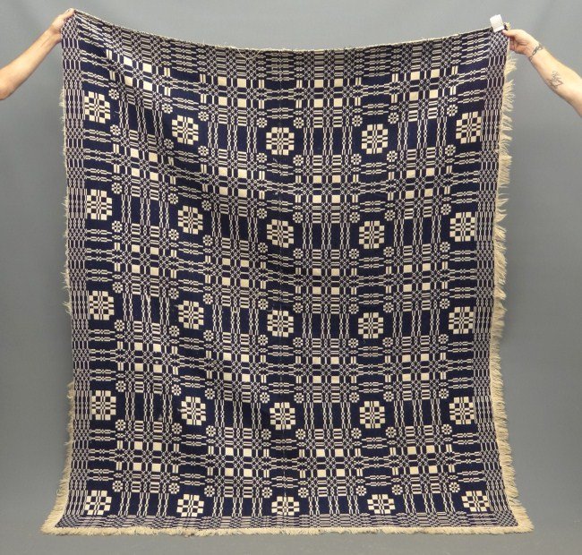 Coverlet: 19th c. blue and white coverlet. 66" x 82".