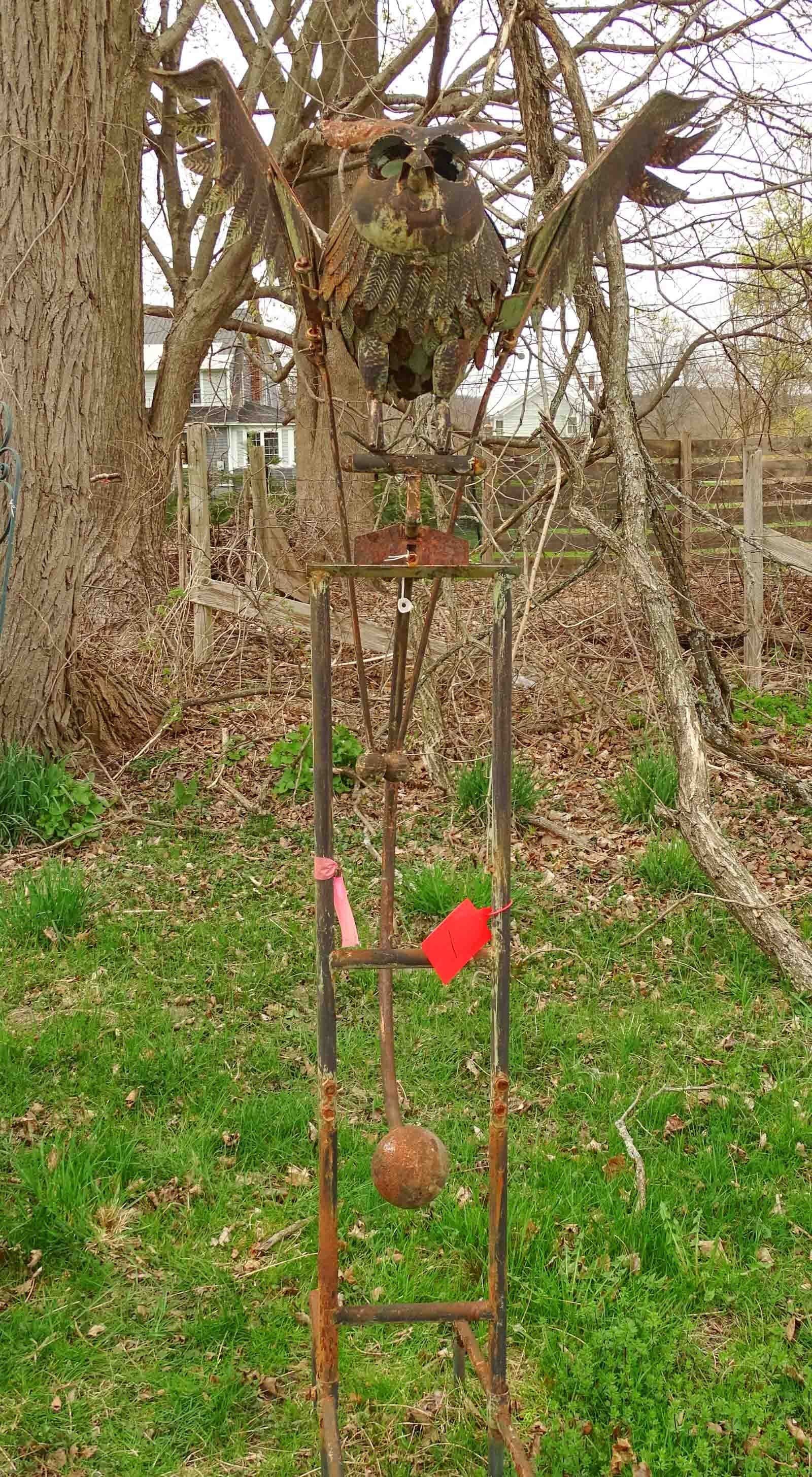 Metal Articulating Owl Sculpture: Metal articulating owl garden sculpture. 37" wing span, 57" Ht., 54" base. Barbara Packer Collection.